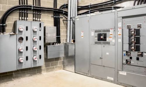 Electrician installing Kohler standby generator in North Georgia home, emphasizing the installation process